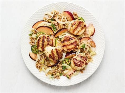 grilled-scallops-with-farro-and-plum-salad-food-network image