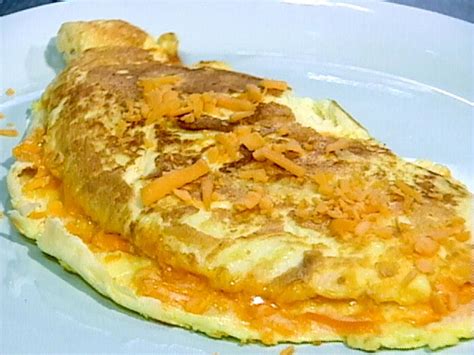 light-and-fluffy-omelets-recipe-emeril-lagasse-food image