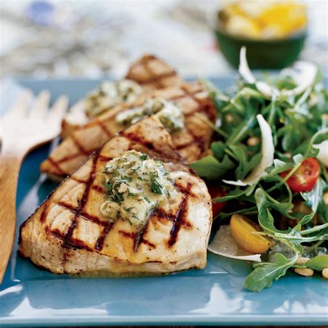 grilled-swordfish-steaks-with-basil-caper-butter-food image
