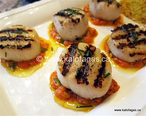 grilled-scallops-with-roasted-red-pepper-sauce image
