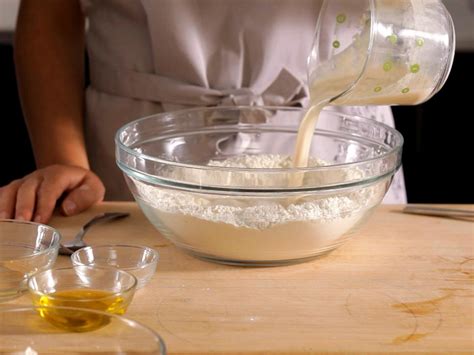 how-to-make-and-form-pizza-dough-cooking-school image