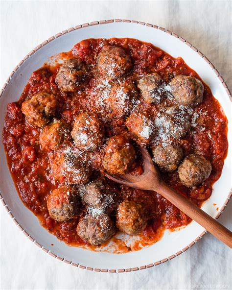 spanish-style-lamb-meatballs-with-spicy-tomato-sauce image