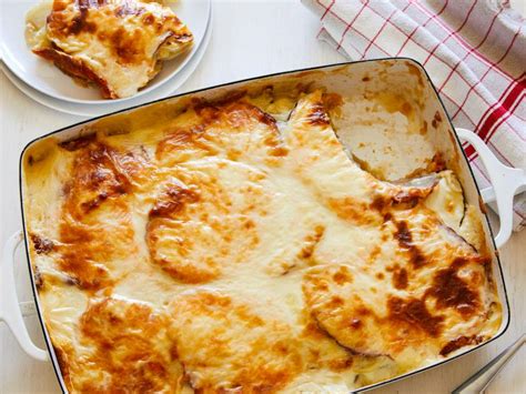 scalloped-potatoes-with-ham-recipe-food-network image