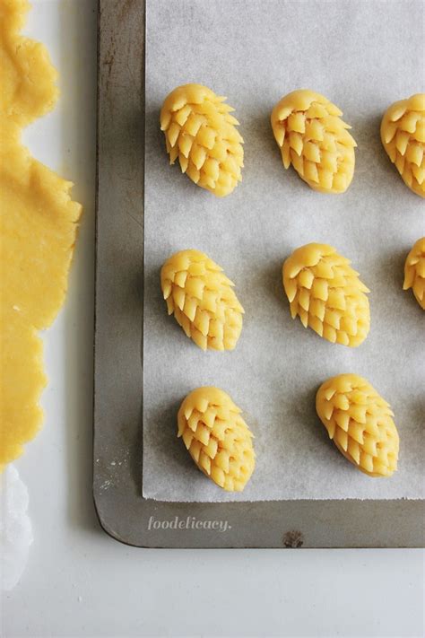 golden-pineapple-tarts-aka-golf-ball-tarts-foodelicacy image