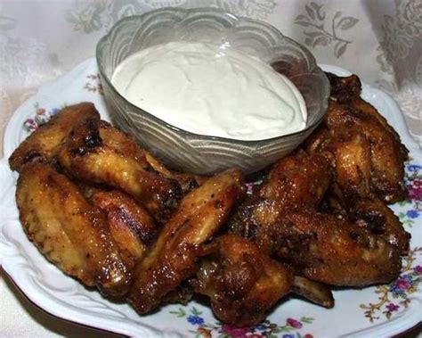 hot-buffalo-wings-with-roquefort-dip-recipe-foodcom image