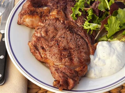 rib-eye-steaks-with-stilton-sauce-recipe-food-network image
