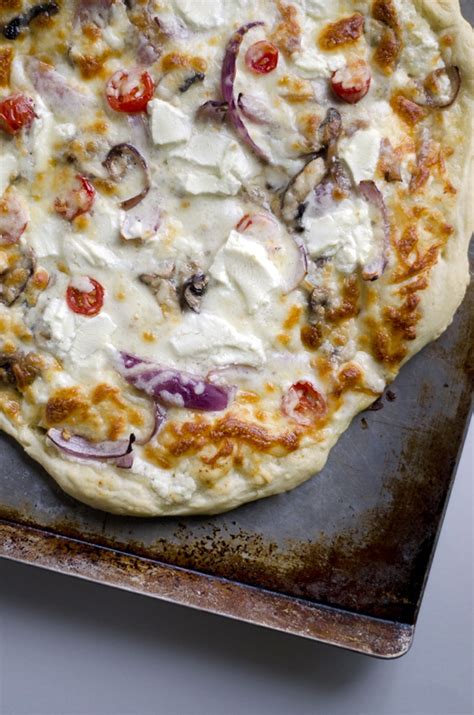 goat-cheese-pizza-with-mushrooms-and-white-sauce image