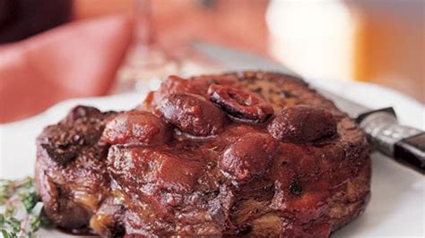 herb-rubbed-steaks-with-olives-provenale image