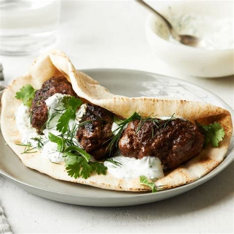 spiced-middle-eastern-lamb-patties-with-pita-and-yogurt image