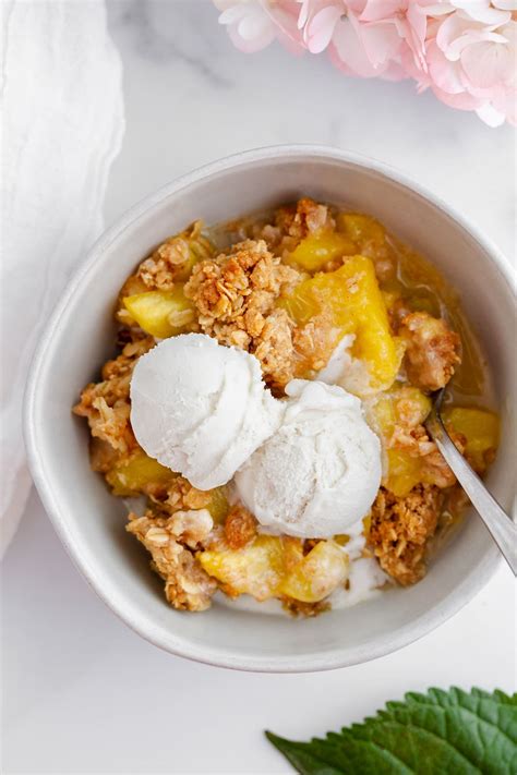 peach-crisp-recipe-with-crunchy-oat-topping-girl image