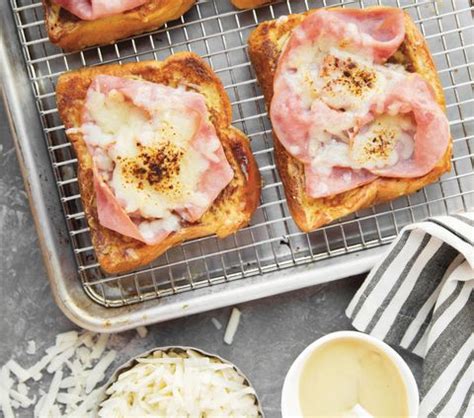 french-toast-ham-and-cheese-sandwiches-delish image
