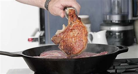 smothered-pork-chops-recipe-chef-billy-parisi image