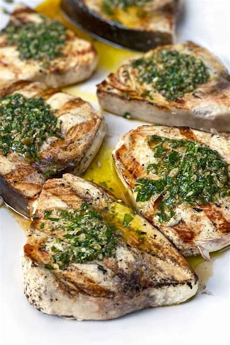 grilled-swordfish-steaks-salsa-verde-panning-the image