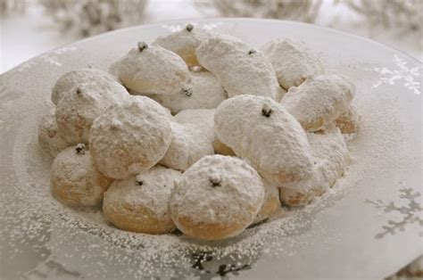 greek-almond-shortbread-cookies-kourabiethes image