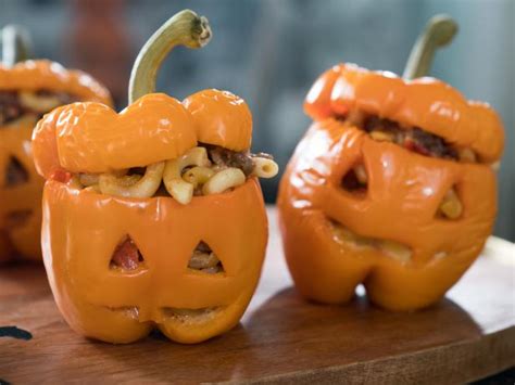 jack-o-lantern-stuffed-peppers-recipe-food-network image