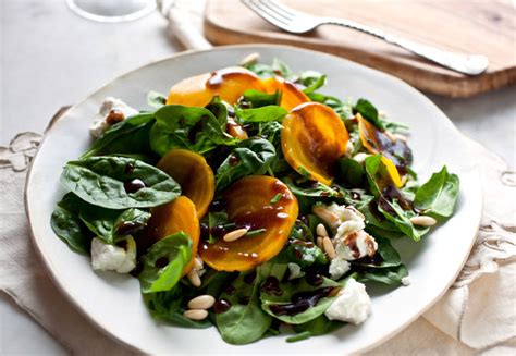 beets-and-goat-cheese-on-a-bed-of-spinach-nyt image