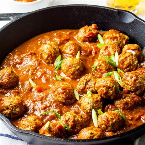spiced-lamb-meatballs-in-a-fragrant-tomato-sauce image