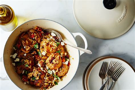 chicken-thighs-with-tomato-orzo-olives-feta image