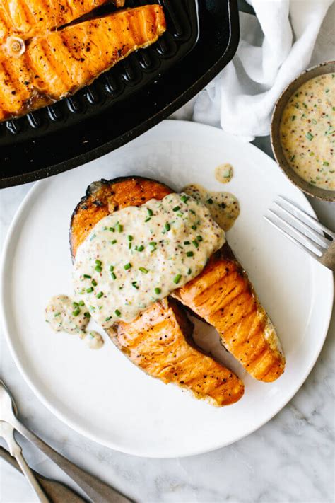 grilled-salmon-steaks-with-creamy-mustard-chive-sauce image