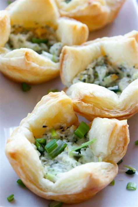 herb-and-goat-cheese-puff-pastry-bites-delicious-on-a image