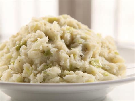 leek-mashed-potatoes-recipe-sandra-lee-food-network image