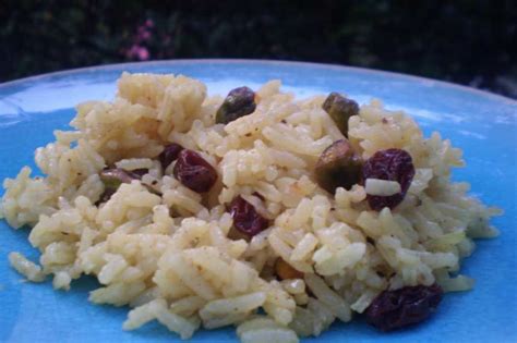 indian-sweet-saffron-rice-with-raisins-and-pistachios image