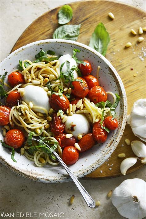 oven-roasted-tomatoes-recipe-with-pasta-pine-nuts image