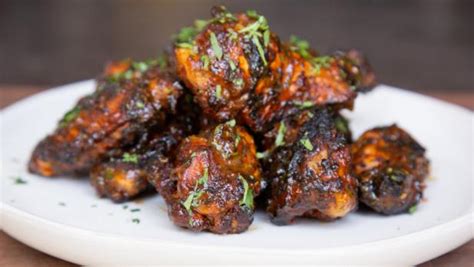 best-grilled-jerk-spiced-chicken-wings-with-mango image