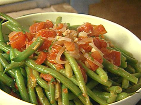 sauteed-green-beans-with-tomatoes-and-basil-served image