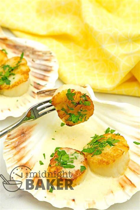 scallops-with-roasted-garlic-cream-sauce-the image