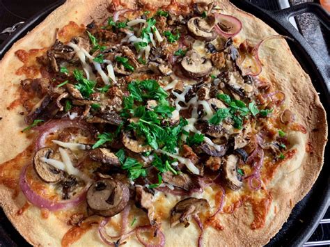sausage-red-onion-and-wild-mushroom-pizza-the image