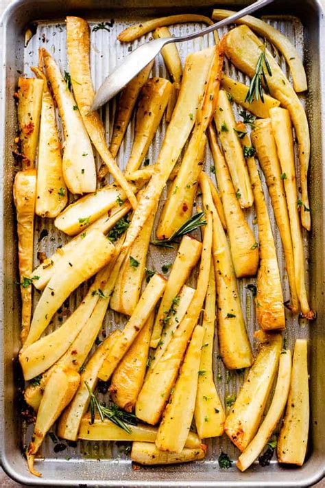 easy-garlic-butter-roasted-parsnips-recipe-diethood image