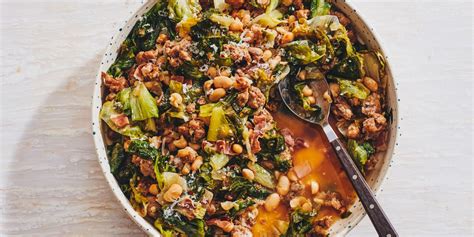escarole-with-italian-sausage-and-white-beans-epicurious image