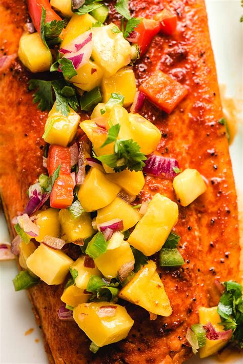 salmon-with-mango-salsa-baked-or-grilled-neighborfood image