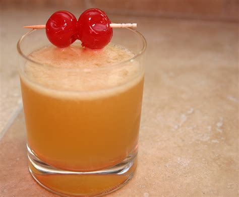 bourbon-sour-cocktail-recipe-food-republic image
