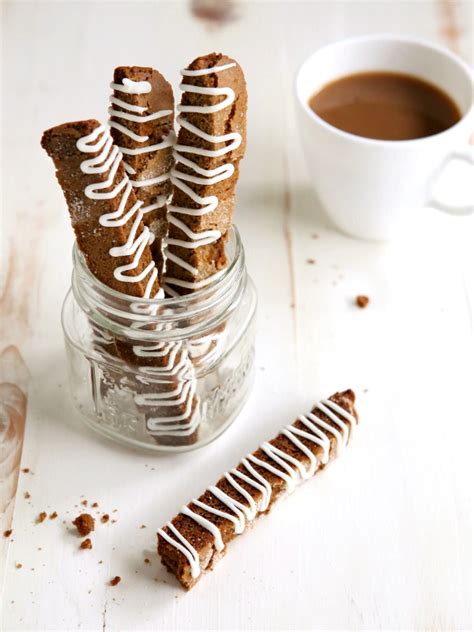 gingersnap-biscotti-with-white-chocolate-drizzle image