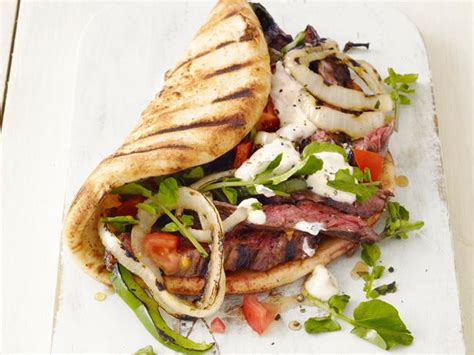 grilled-skirt-steak-gyros-recipe-food-network-kitchen image