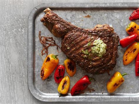 rib-eye-steak-with-herb-butter-and-charred-peppers image