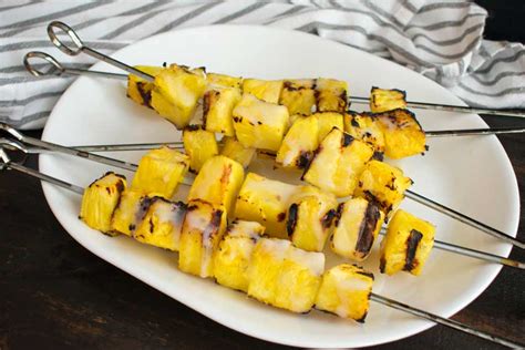 grilled-pineapple-with-coconut-rum-sauce-the image