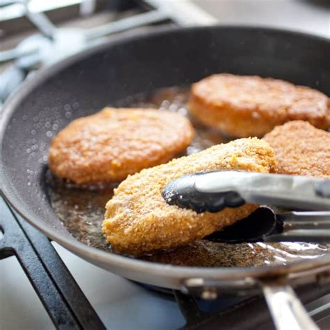 crispy-pan-fried-pork-chops-americas-test-kitchen image
