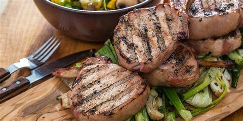 smoked-brined-bone-in-pork-chops-recipe-traeger image