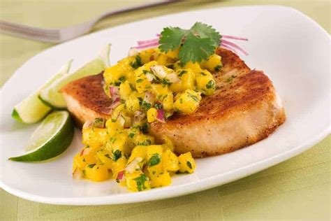 air-fryer-swordfish-with-mango-salsa-fork-to-spoon image