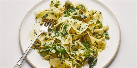herby-pasta-with-garlic-and-green-olives-recipe-epicurious image