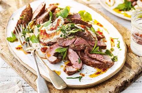 grilled-lamb-with-houmous-and-harissa image