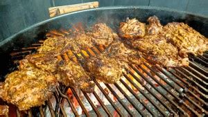 spicy-grilled-jerk-chicken-thighs-smoked-bbq-source image