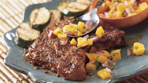 grilled-jamaican-jerk-pork-chops-with-mango-salsa image