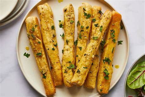 garlic-breadsticks-recipe-the-spruce-eats image