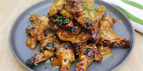 andrew-zimmern-cooks-grilled-chicken-wings image