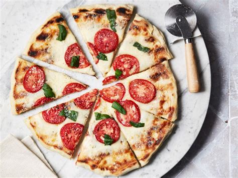 grilled-pizza-with-fresh-tomato-and-basil-food-network image