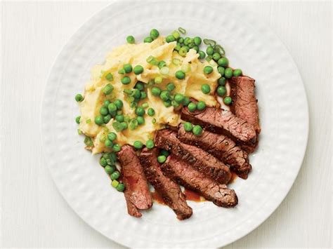skirt-steak-with-cheesy-mashed-potatoes-food-network image